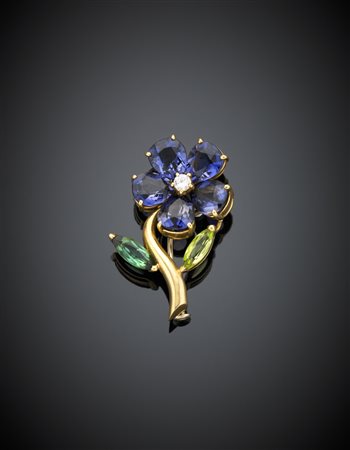 Spilla in oro giallo a guisa di fiore con pietre sintetiche di vario colore,...