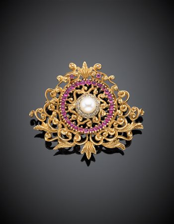 Spilla in oro giallo/rossastro e bianco con diamanti irregolari e rubini...