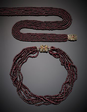 Due collane multifili a torchon in granati violacei, una sfaccettati e...
