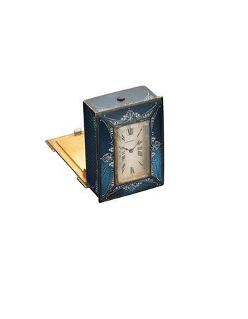 HAUSMANN & co Orologio da viaggio a forma di bauletto in metallo smaltato...