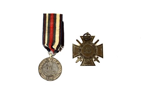 Lotto composto da due medaglie croce d'onore. Germania, II Guerra Mondiale