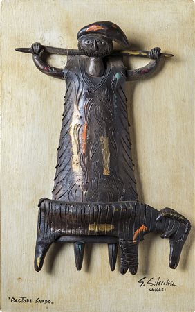 GIUSEPPE SILECCHIA Pastore sardo, Anni ‘60 Altorilievo in ceramica dipinta su...