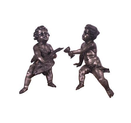 SCUOLA ROMANA, XVIII secolo. Coppia di putti Olio su tela, cm 103 x 78....