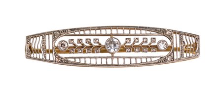 Spilla deco oro e oro bianco con diamanti. Peso gr. 6,30