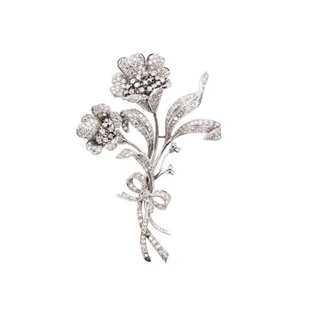 Spilla a fiore anni 50 . due diamanti mancanti