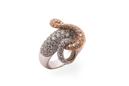 Anello con diamanti e cerchio mobile .Oro 18 Kti bianco e rosa. Diamanti cti...