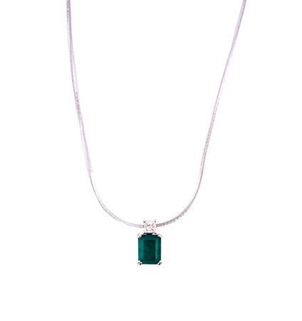 Ciondolo con smeraldo e diamante . Smeraldo cti. 2,30 c.ca diamante pricess...