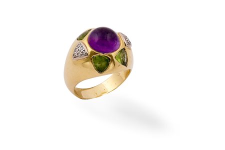 Anello con pietra viola e e brillantini . gr. 13,00
