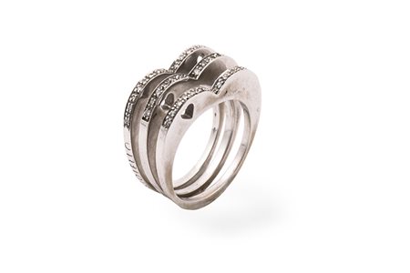 Tre anelli piatti con diamanti .Oro 18 Kti diamanti cti 0.30 c.ca Peso gr. 14.20