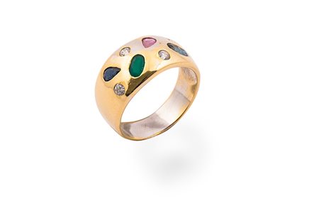 Anello a fascia con varie pietre di colore .Oro 18 Kti Peso gr. 7,10