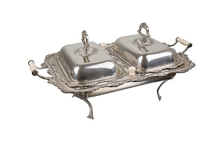 Scaldavivande con manici in avorio .Argento 800/°°° gr. 3,40