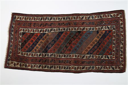 CURDISTAN Tappeto orientale. Persia. 1880. Lana e cotone. Cm 127,00 x 250,00....