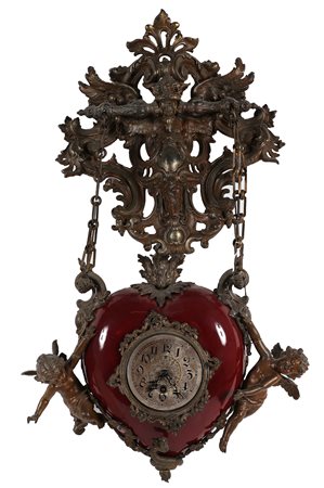 MANIFATTURA ITALIANA DEL XIX SECOLO Orologio in porcellana e bronzo con putti...