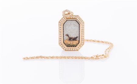 Pendente in oro gr 13.50 e micromosaico zoomorfo e diamanti cts 0.75 circa. ....