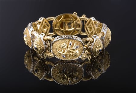 Bracciale in oro giallo e bianco 18 kt gr 84.50. . . [Nessun Autore] . . .