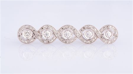 Spilla oro bianco diamanti cts 1 + 8x8 cts 0.80 oro gr 8. . . [Nessun Autore]...