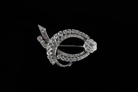 Spilla in oro bianco gr 11.20 e diamanti cts 5.30 circa. . . [Nessun Autore]...