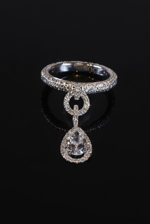 Anello in oro bianco gr 5.4 e goccia cts. 1.28 Fvvs2 e brillanti per cts....