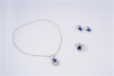 Parure composta da: un anello in platino gr 10.40, diamanti cts 1.50, zaffiro...