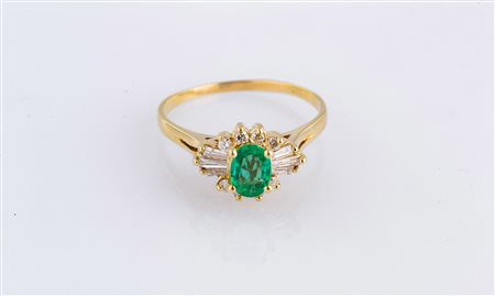 Anello con smeraldo ovale e diamanti, oro gr 4.20. . . [Nessun Autore] . . .
