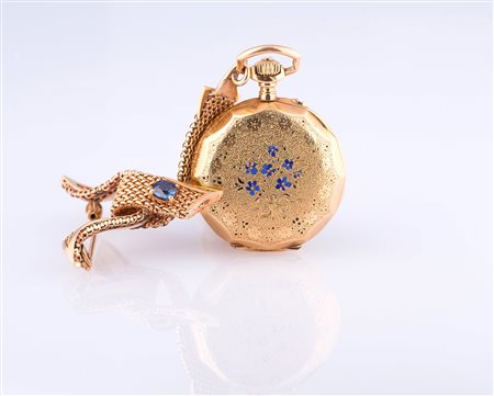 Orologio spilla in oro 18 k con incisioni sul fronte e sul retro, gr 48...